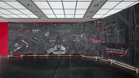 Das Bild zeigt eine große Leinwand, die sich über eine lange und eine kürzere Wand erstreckt und über Eck geht. Darauf ist ein Scherenschnitt aus schwarzem Papier zu sehen. Im Hintergrund ist eine rot gestrichene Wand.