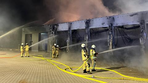 Firefighters with hoses