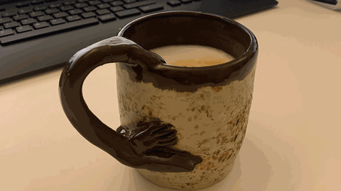 Kaffeetasse mit geschwungenem Halter