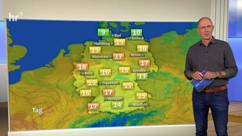 Moderator Ranft neben Wetterkarte Hessen mit Temperaturen um 14 Grad