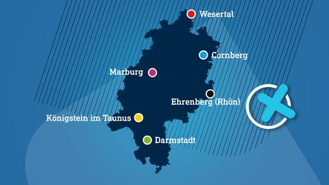 Eine Hessenkarte mit eingezeichneten Ortspunkten in Parteifarben.