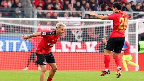 Goppel und Lee bejubeln das 1:1. 