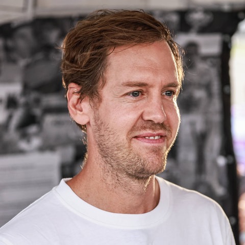 Sebastian Vettel grinst leicht