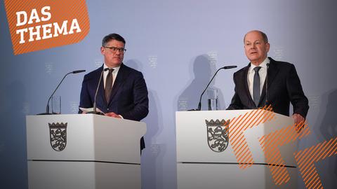 Hessens Ministerpräsident Boris Rhein (CDU) und Bundeskanzler Olaf Scholz (SPD)